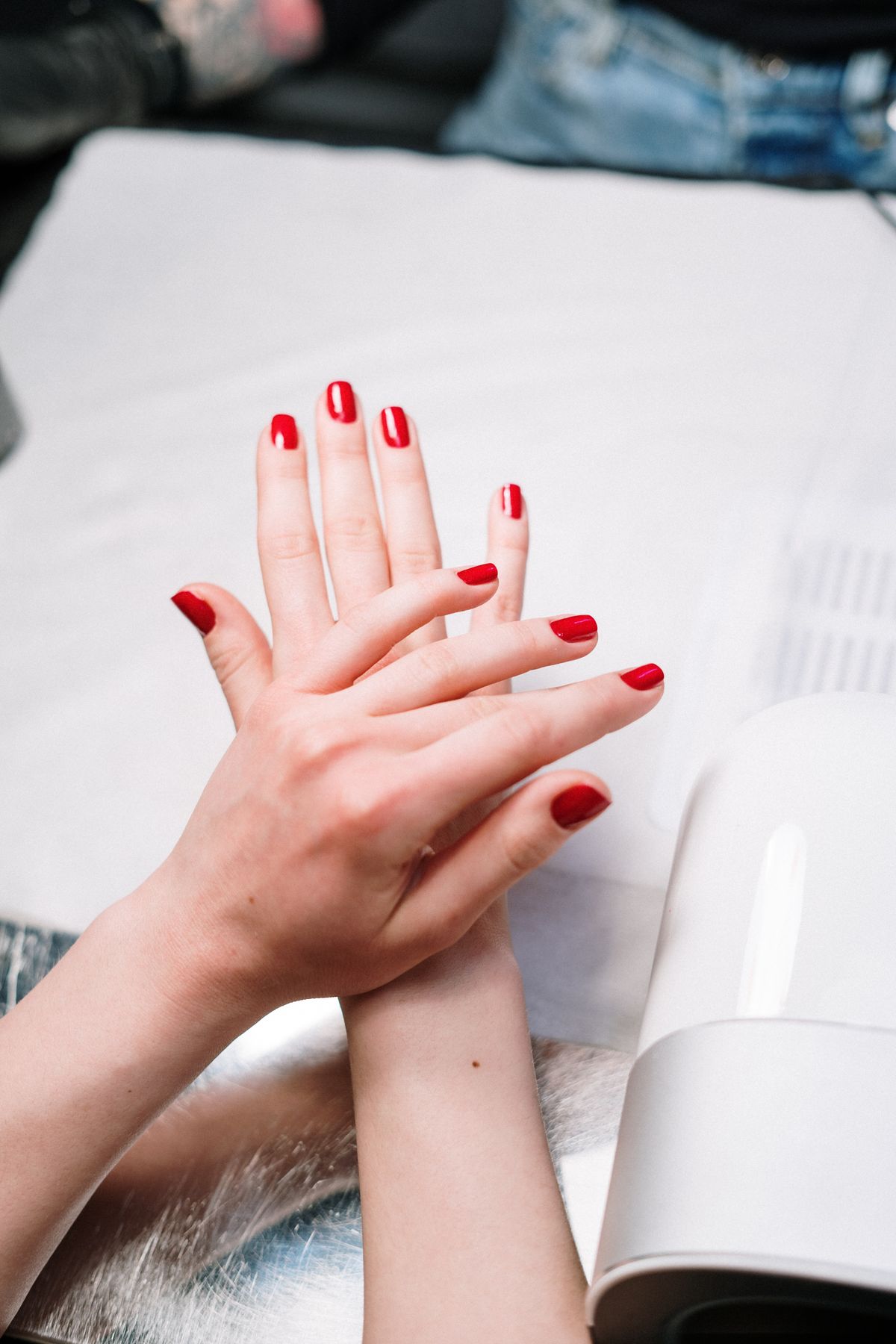 Detail-focused nail technique at Hello Bella Nail & Spa